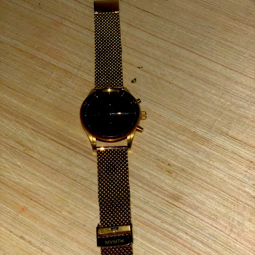 MVMT gold voyager eclipse. Works fine may need adjusting/slight ware/tear.